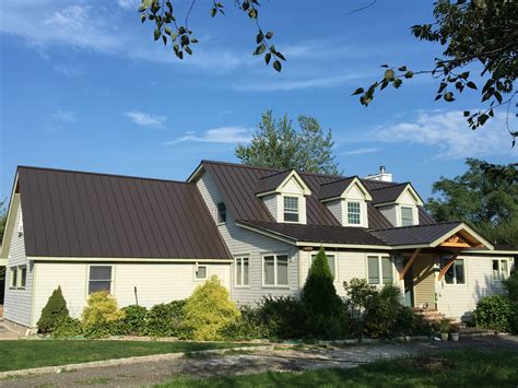 houses with bronze metal roof|dark bronze metal roof pictures.